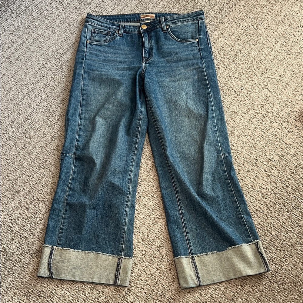 Kut from the Kloth Dark Blue Flare Jeans with wide cuff. Side panel detail.
